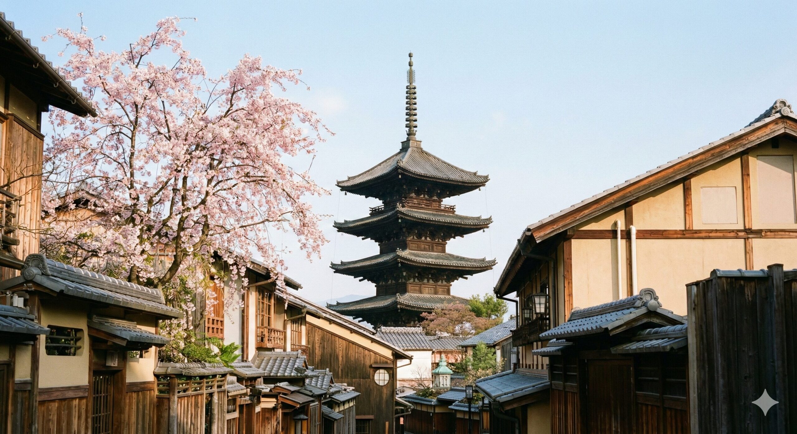 京都・御室にある仁和寺の五重塔と、桜が咲く歴史的な町並みの風景。オムロンの社名の由来となった由緒ある土地の雰囲気を伝えている。 画像2